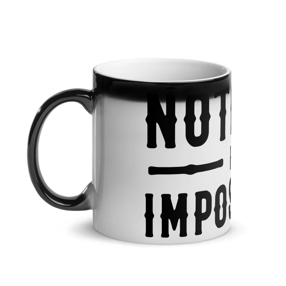 glossy-black-magic-mug-handle-on-left-60d5ee531442f.jpg